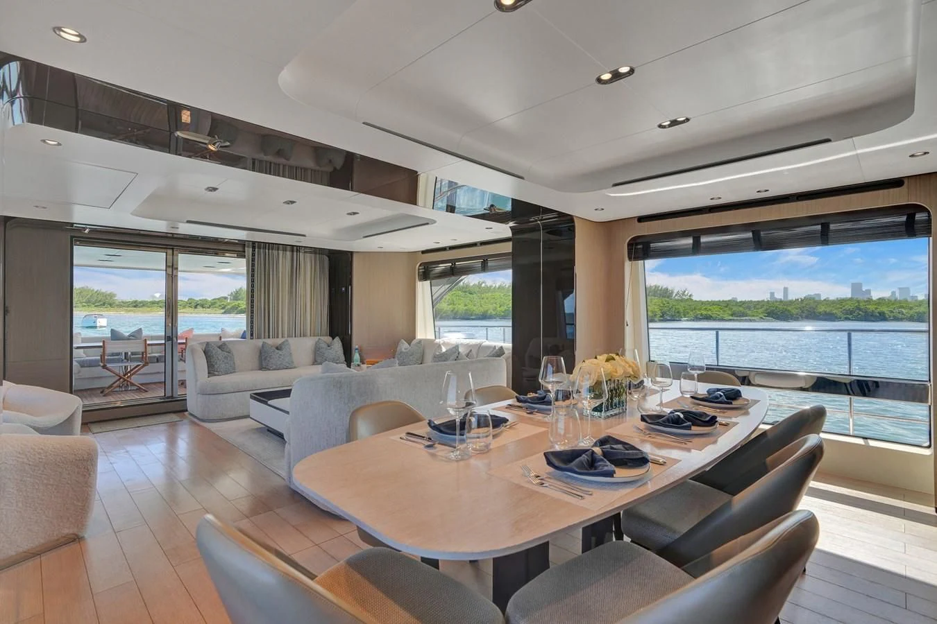a large living room with a large window aboard ENCHANTE Yacht for Sale