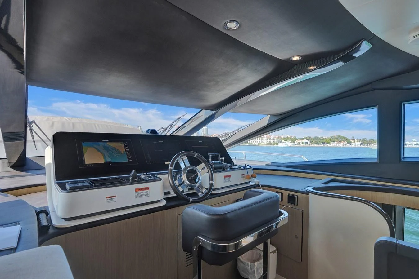 inside of a car aboard ENCHANTE Yacht for Sale