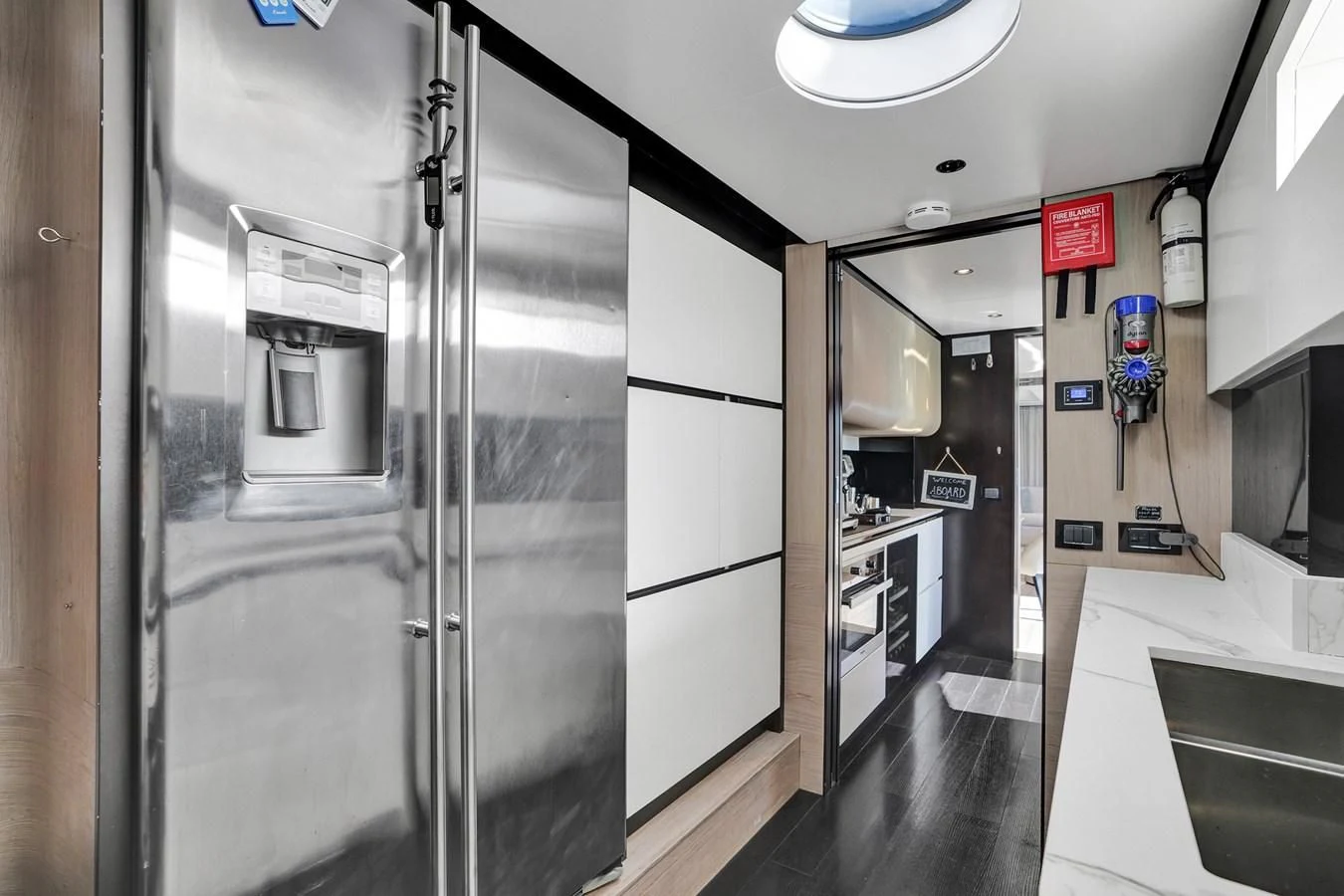 a hallway with doors aboard ENCHANTE Yacht for Sale