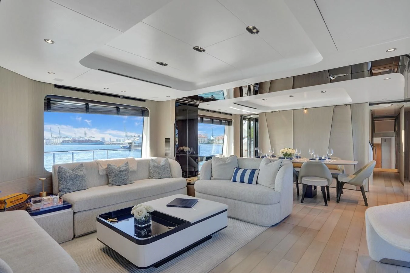 a living room with a large window aboard ENCHANTE Yacht for Sale