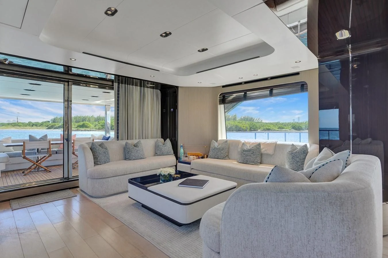 a living room with a large window aboard ENCHANTE Yacht for Sale