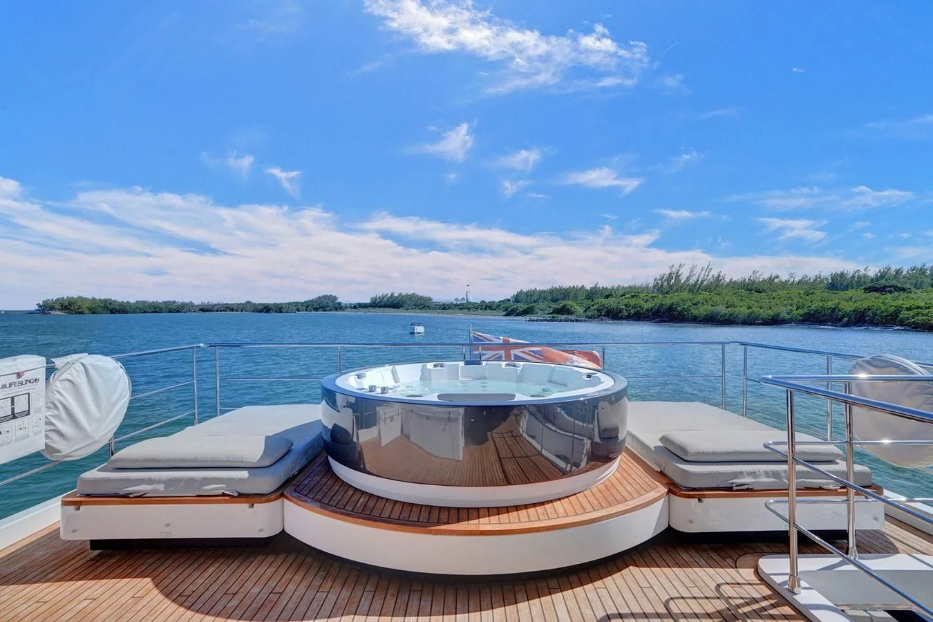 a couple of boats on a dock aboard ENCHANTE Yacht for Sale