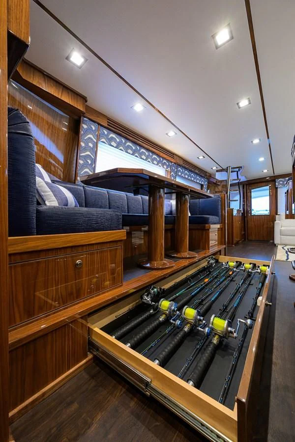 a room with a wood floor and a wood bar with a wood floor aboard FORTY NINER Yacht for Sale