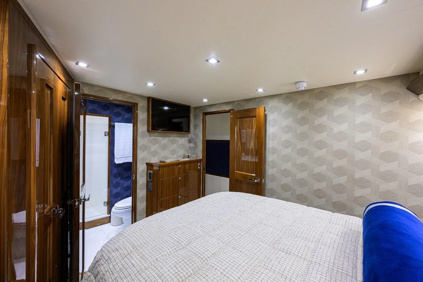 a large bedroom with a large bed aboard FORTY NINER Yacht for Sale