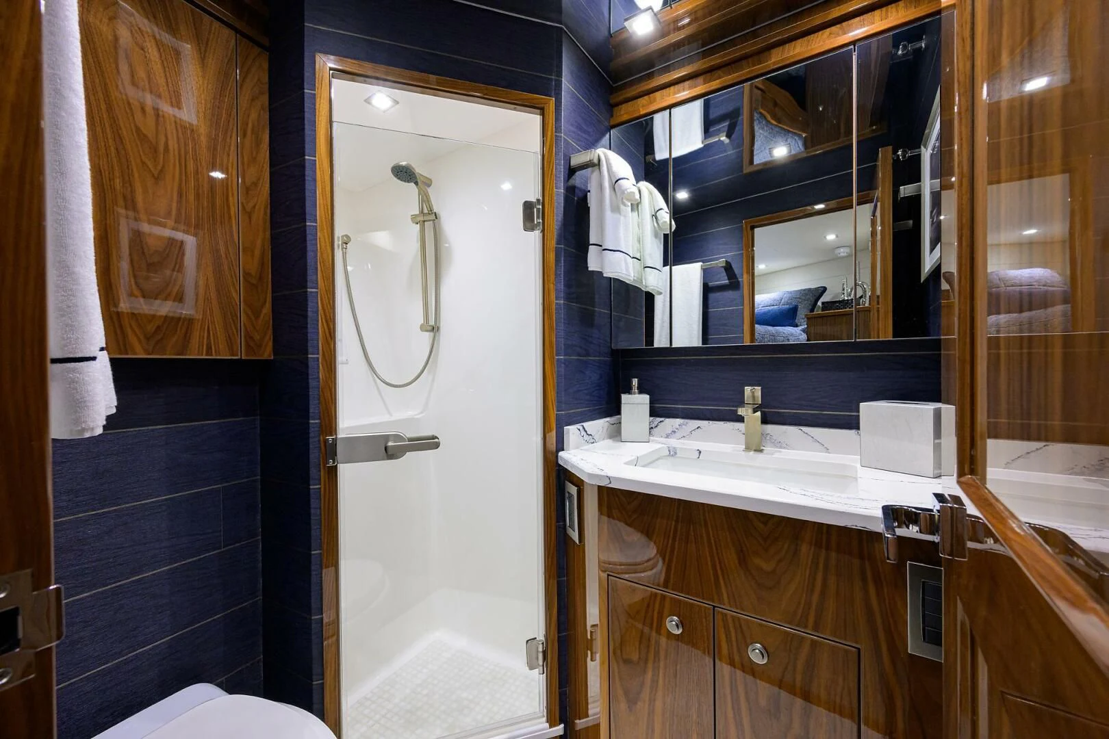 a bathroom with a large mirror aboard FORTY NINER Yacht for Sale