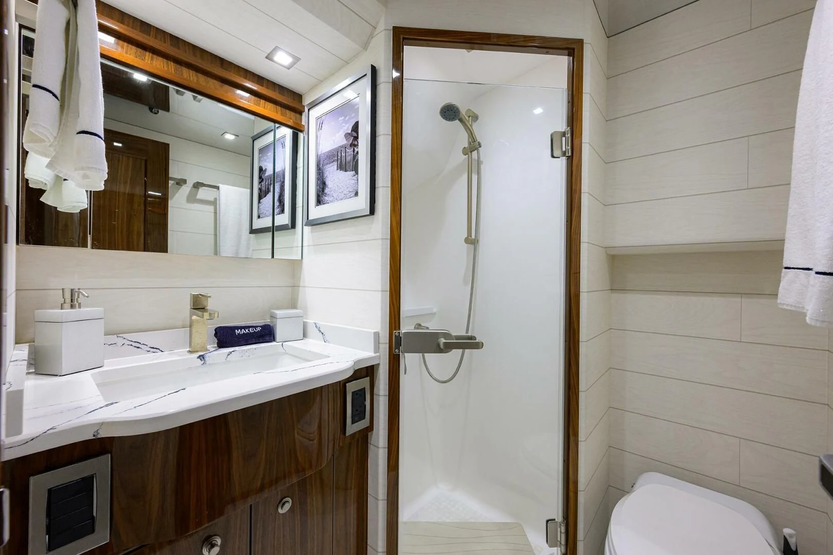a bathroom with a shower and sink aboard FORTY NINER Yacht for Sale