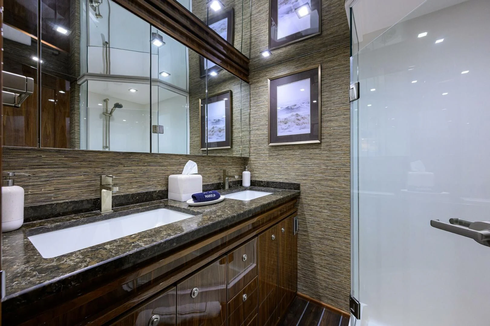 a bathroom with a large mirror aboard FORTY NINER Yacht for Sale