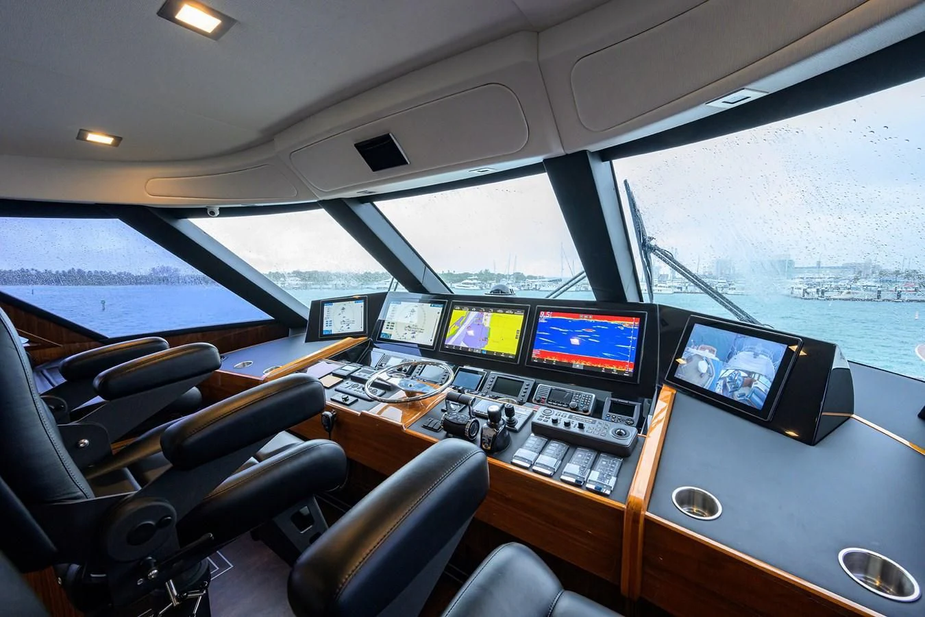 a room with many monitors and computers aboard FORTY NINER Yacht for Sale