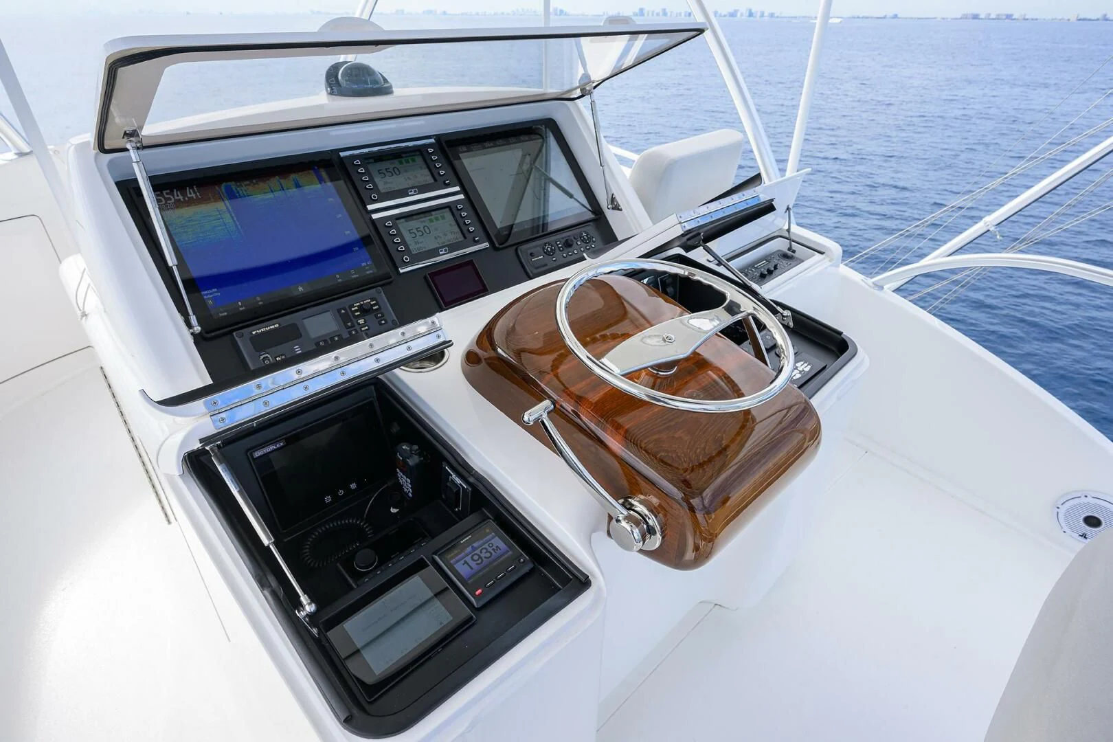 a boat with a couple of glasses on the front aboard FORTY NINER Yacht for Sale