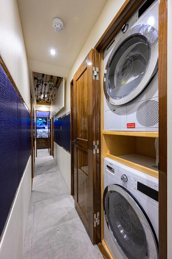 a laundry room with a washing machine aboard FORTY NINER Yacht for Sale