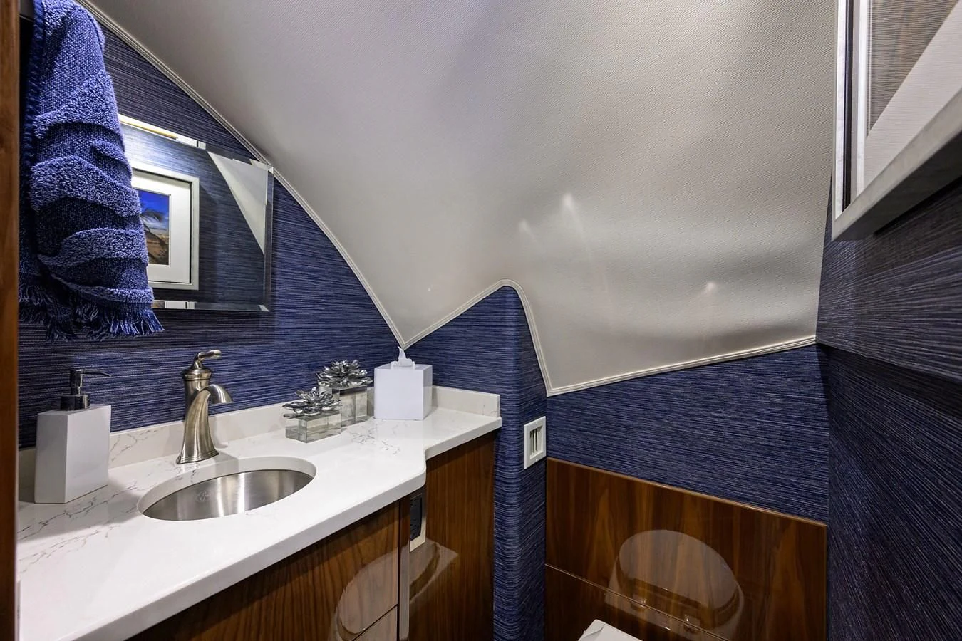 a bathroom with a sink and a mirror aboard FORTY NINER Yacht for Sale