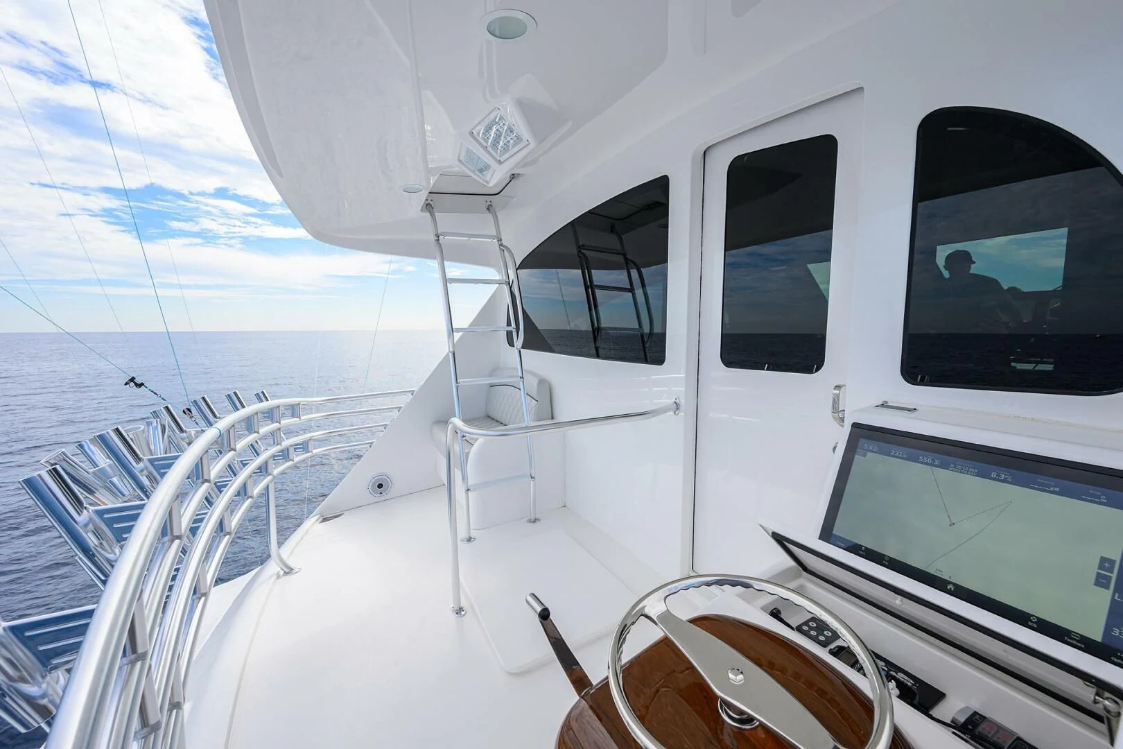 a white boat with a screen aboard FORTY NINER Yacht for Sale