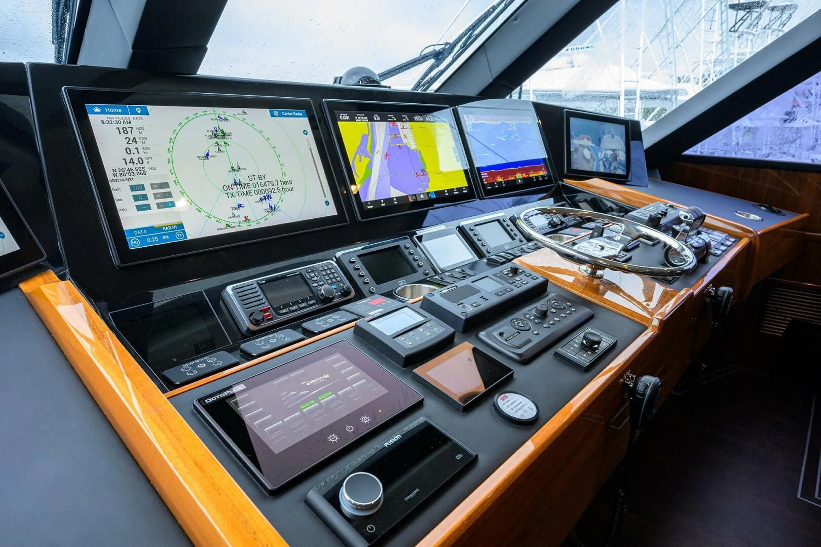 a table with many computer screens aboard FORTY NINER Yacht for Sale