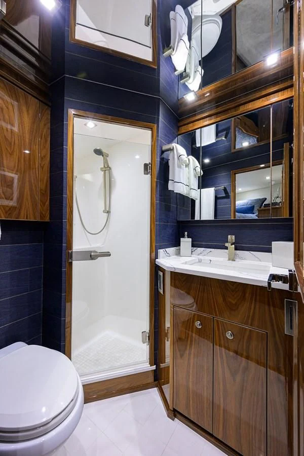 a bathroom with a shower and sink aboard FORTY NINER Yacht for Sale