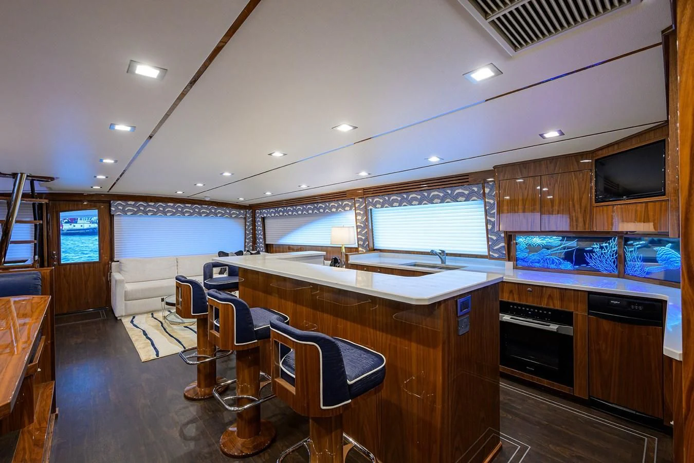 a large kitchen with a bar and bar aboard FORTY NINER Yacht for Sale