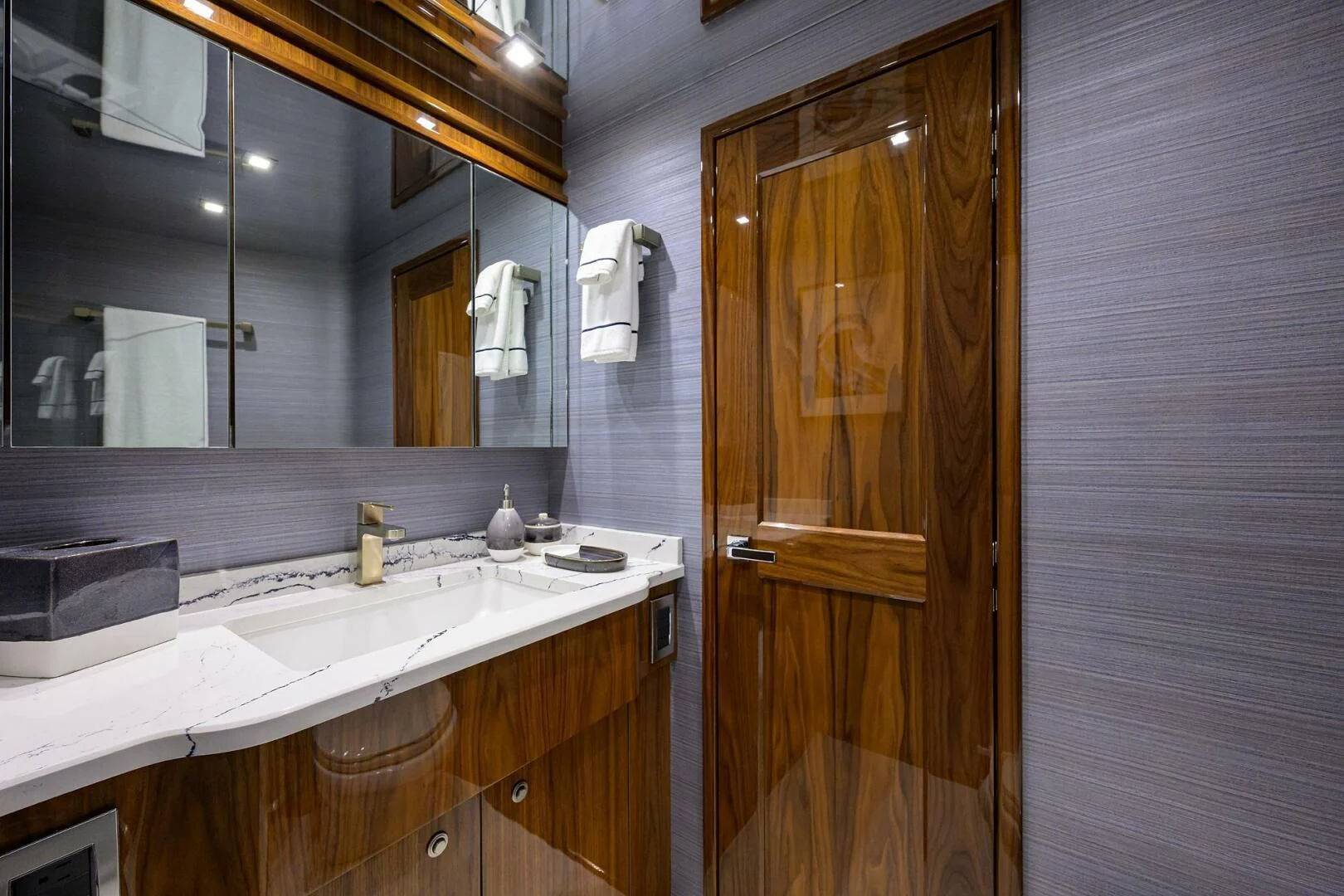 a bathroom with a sink and a mirror aboard FORTY NINER Yacht for Sale