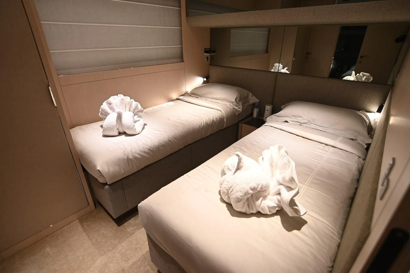 a room with two beds aboard JOYOUS JOURNEY Yacht for Sale