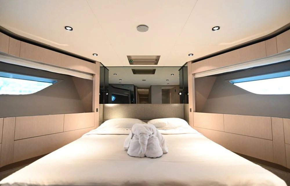 a bed in a room aboard JOYOUS JOURNEY Yacht for Sale