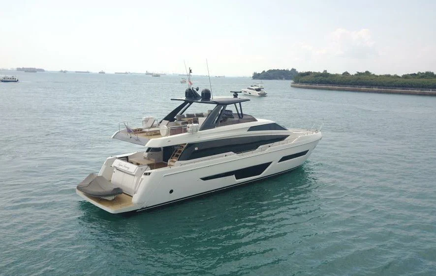a boat on the water aboard JOYOUS JOURNEY Yacht for Sale