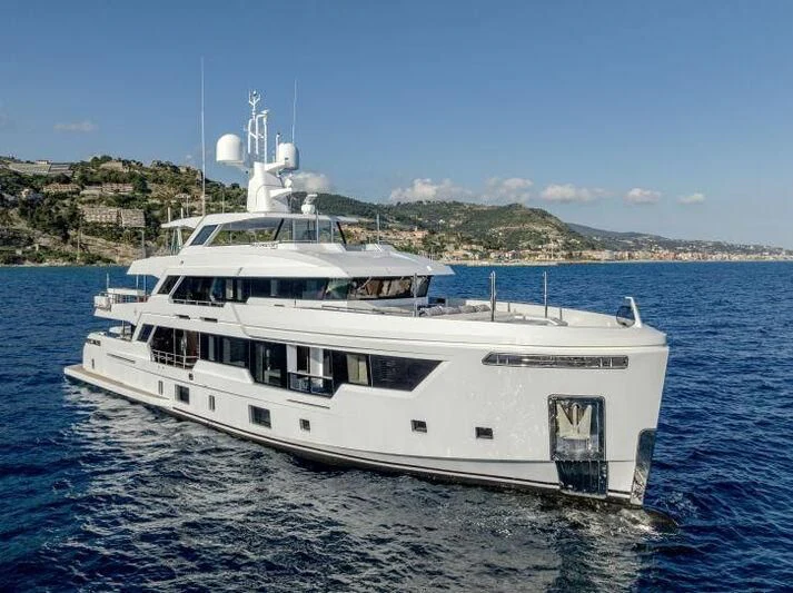 a white yacht in the water aboard CARITA Yacht for Sale
