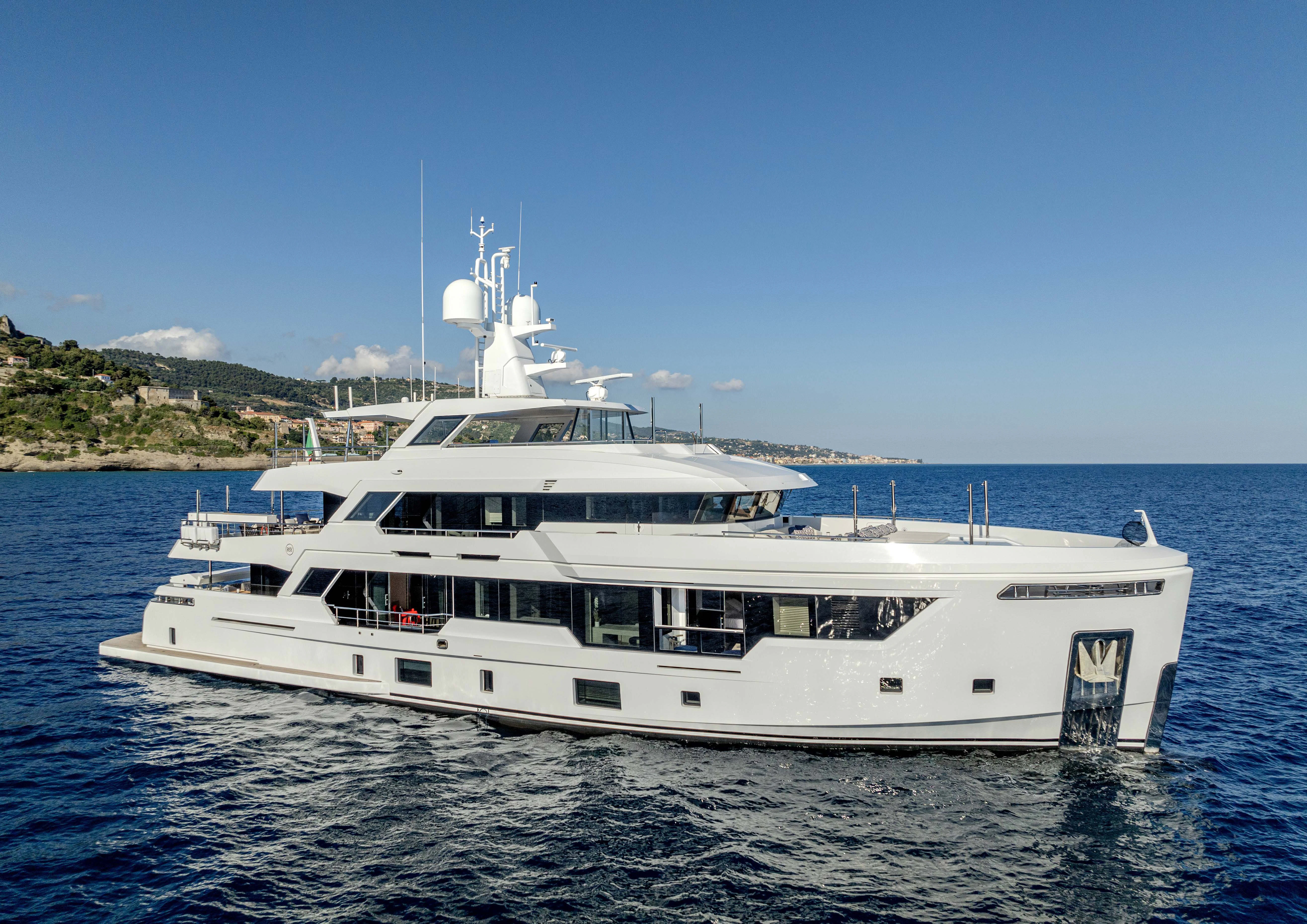 a white yacht in the water aboard CARITA Yacht for Sale