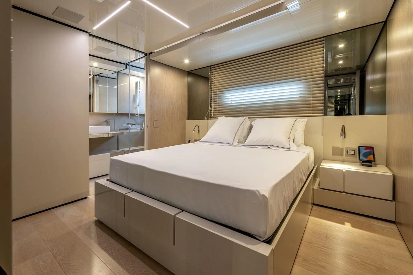 a large bedroom with a large bed aboard CARITA Yacht for Sale