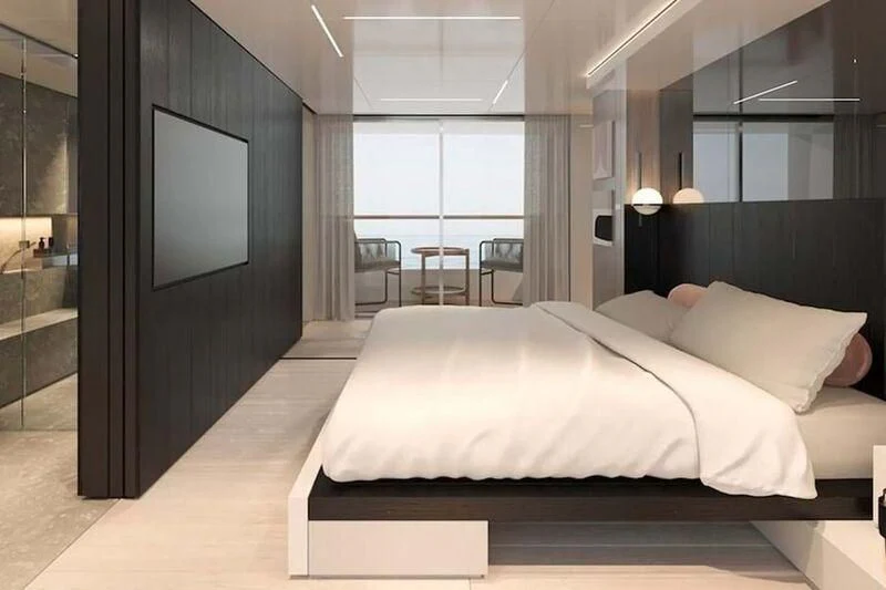 a hotel room with a bed aboard CARITA Yacht for Sale