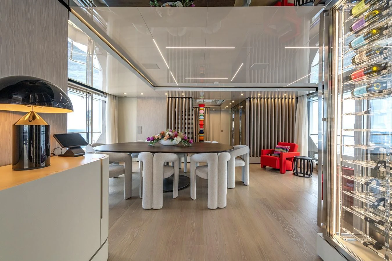 a room with a table and chairs aboard CARITA Yacht for Sale