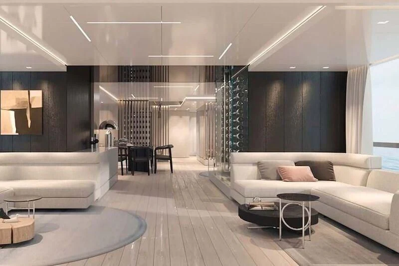 a living room with a couch and a table aboard CARITA Yacht for Sale