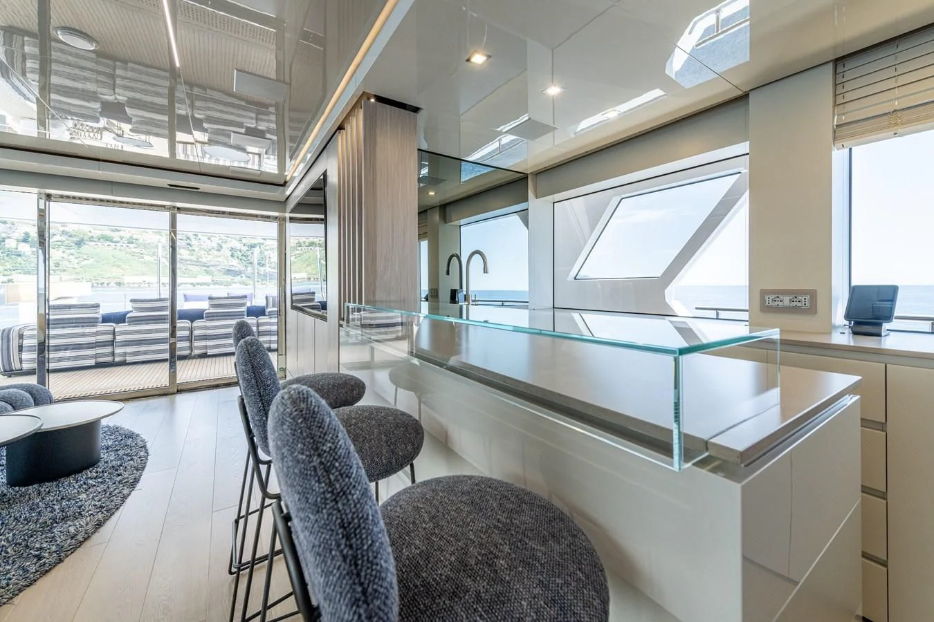 a large room with a pool table aboard CARITA Yacht for Sale