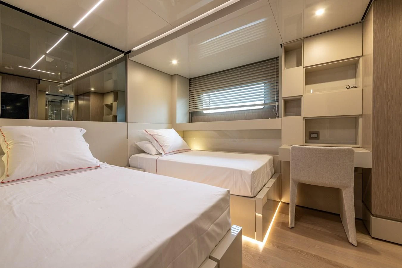 a room with two beds aboard CARITA Yacht for Sale