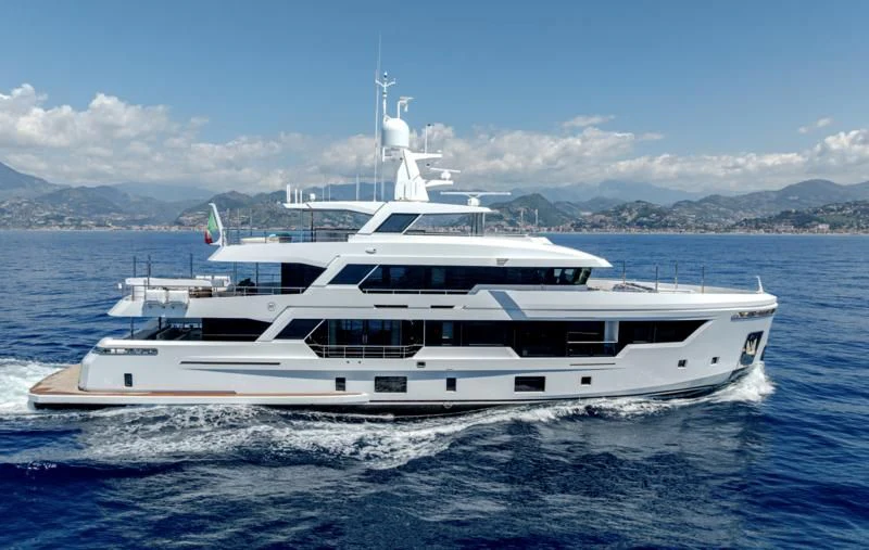 a white yacht in the water aboard CARITA Yacht for Sale