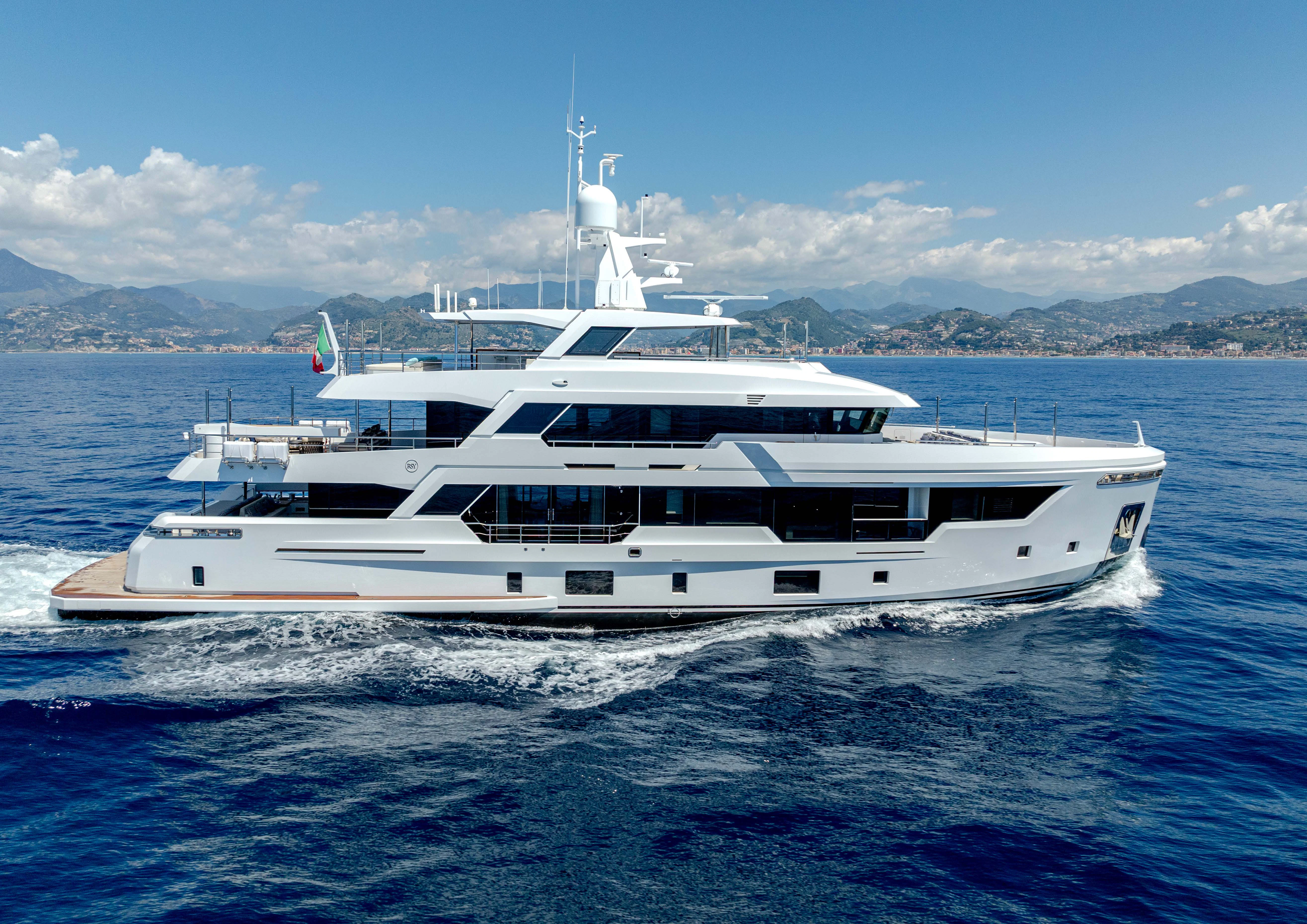 a white yacht in the water aboard CARITA Yacht for Sale