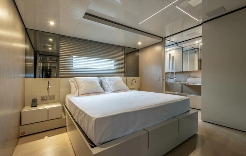 a bed in a room aboard CARITA Yacht for Sale