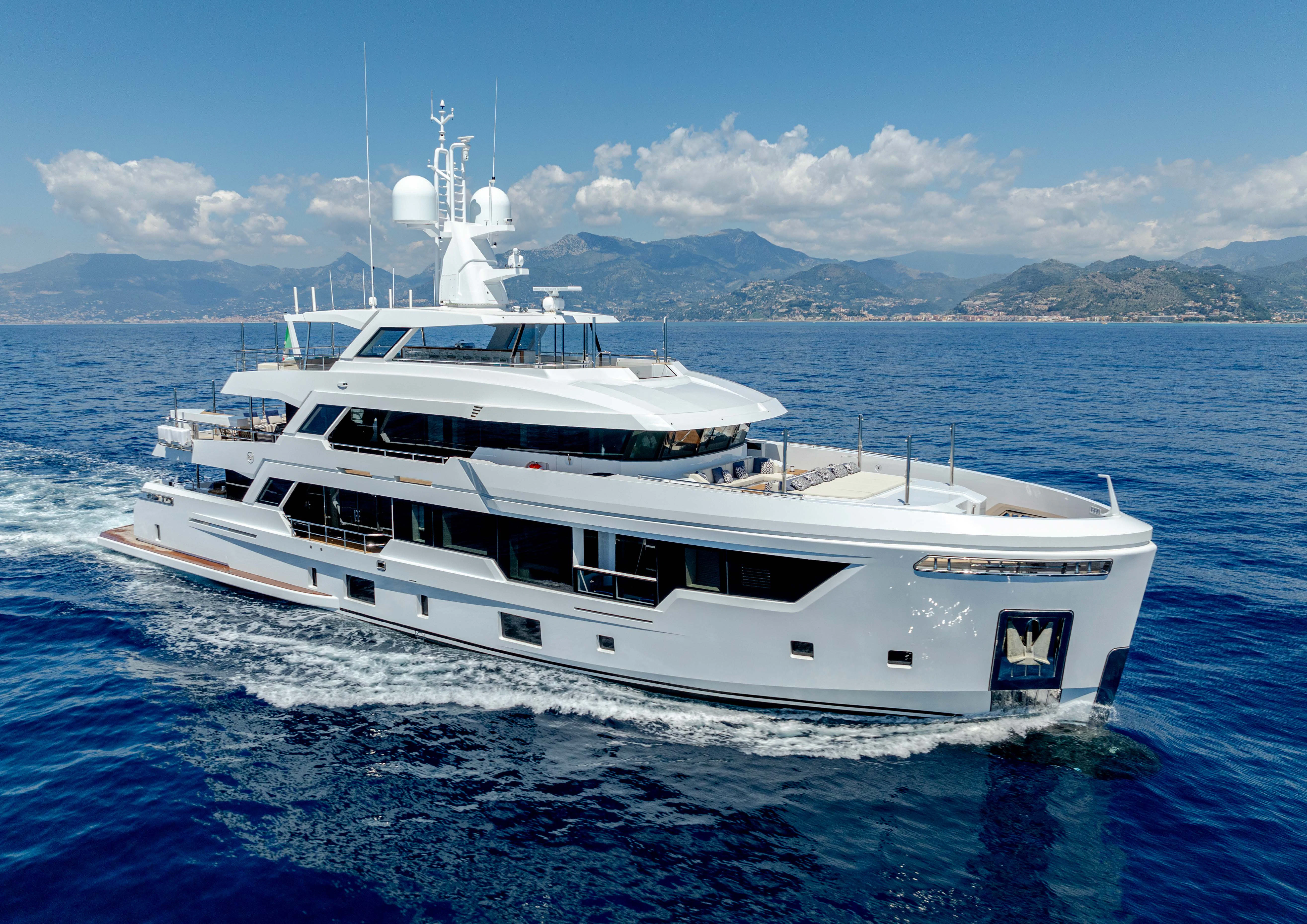 a white yacht on the water aboard CARITA Yacht for Sale