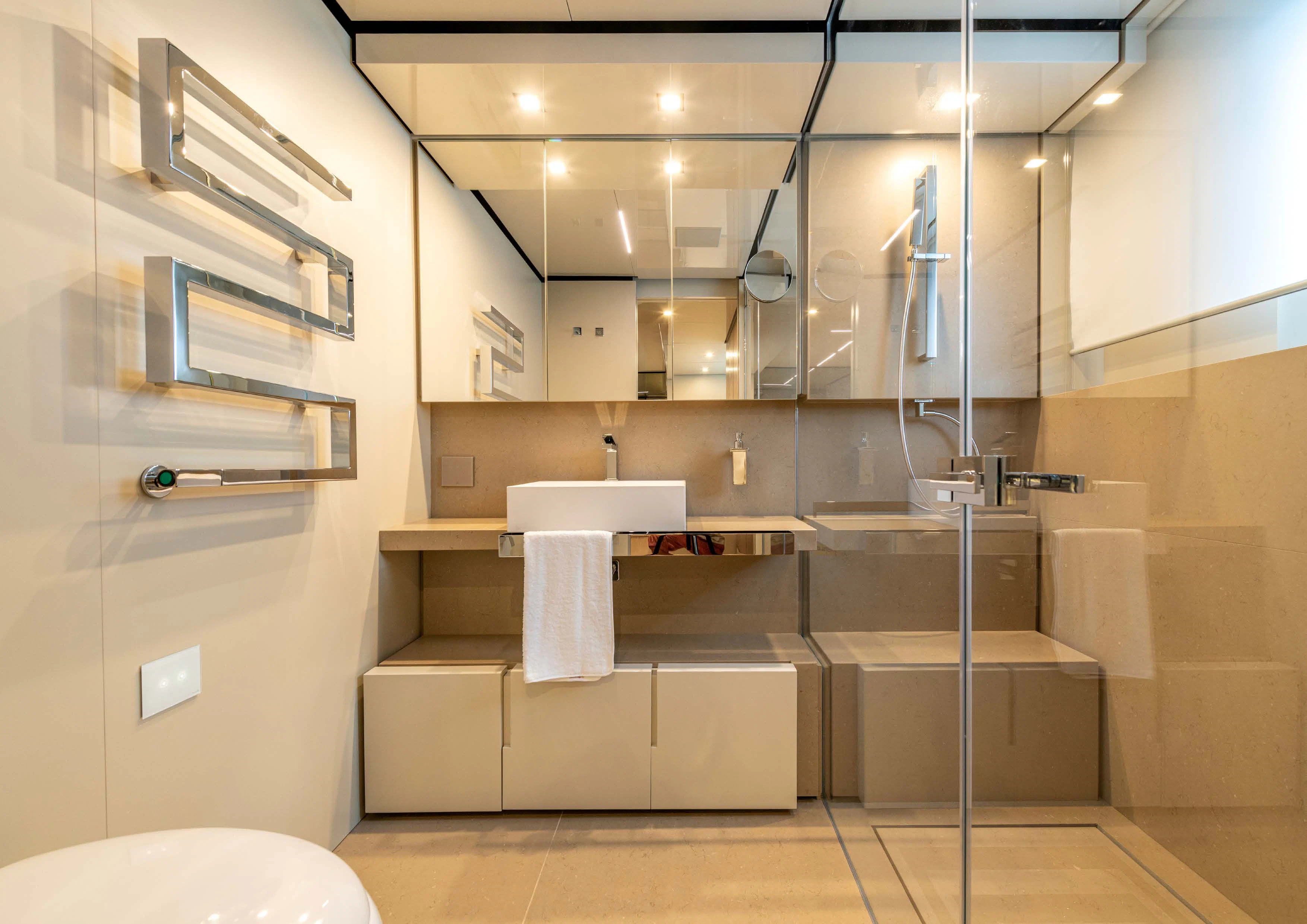 a bathroom with a sink and a mirror aboard CARITA Yacht for Sale