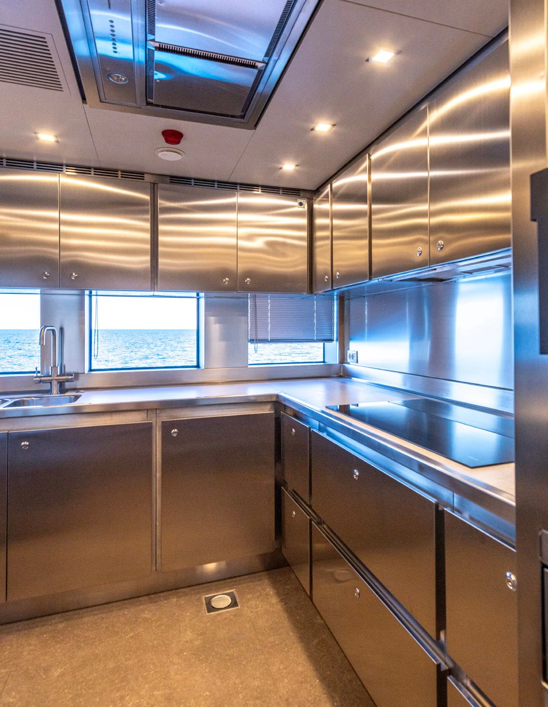 a kitchen with a large sink aboard CARITA Yacht for Sale