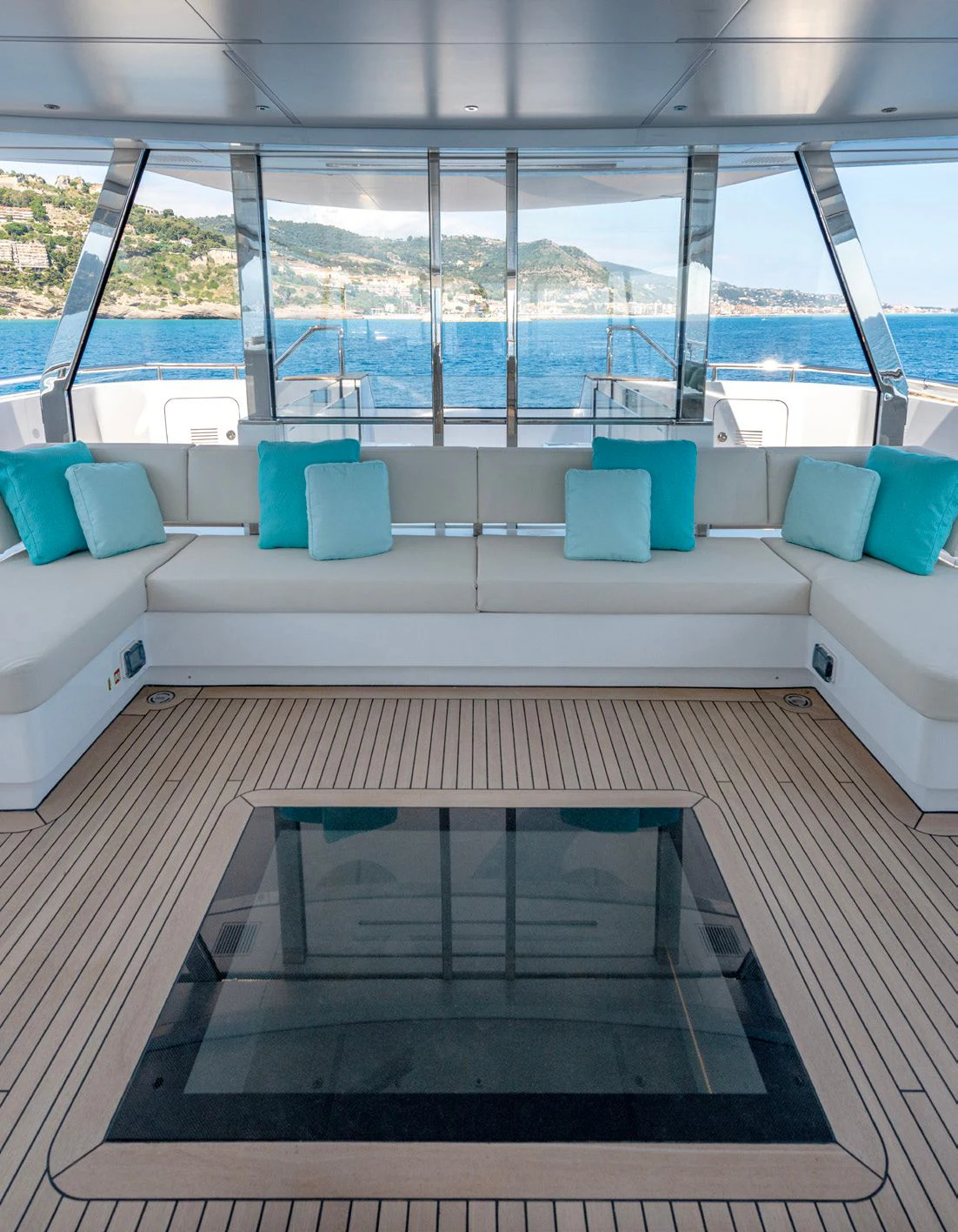 a room with a couch and a table aboard CARITA Yacht for Sale