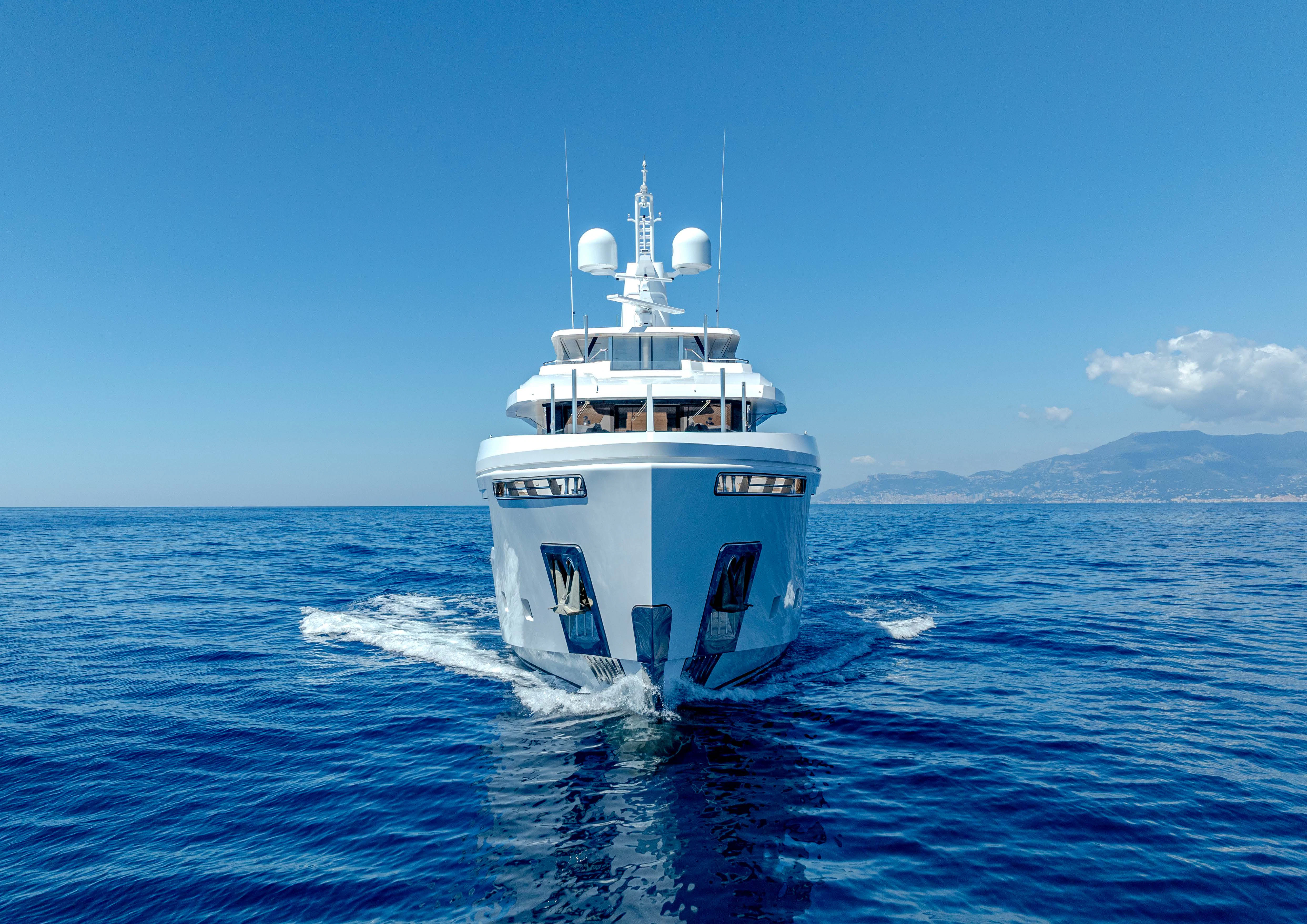 a white boat in the water aboard CARITA Yacht for Sale