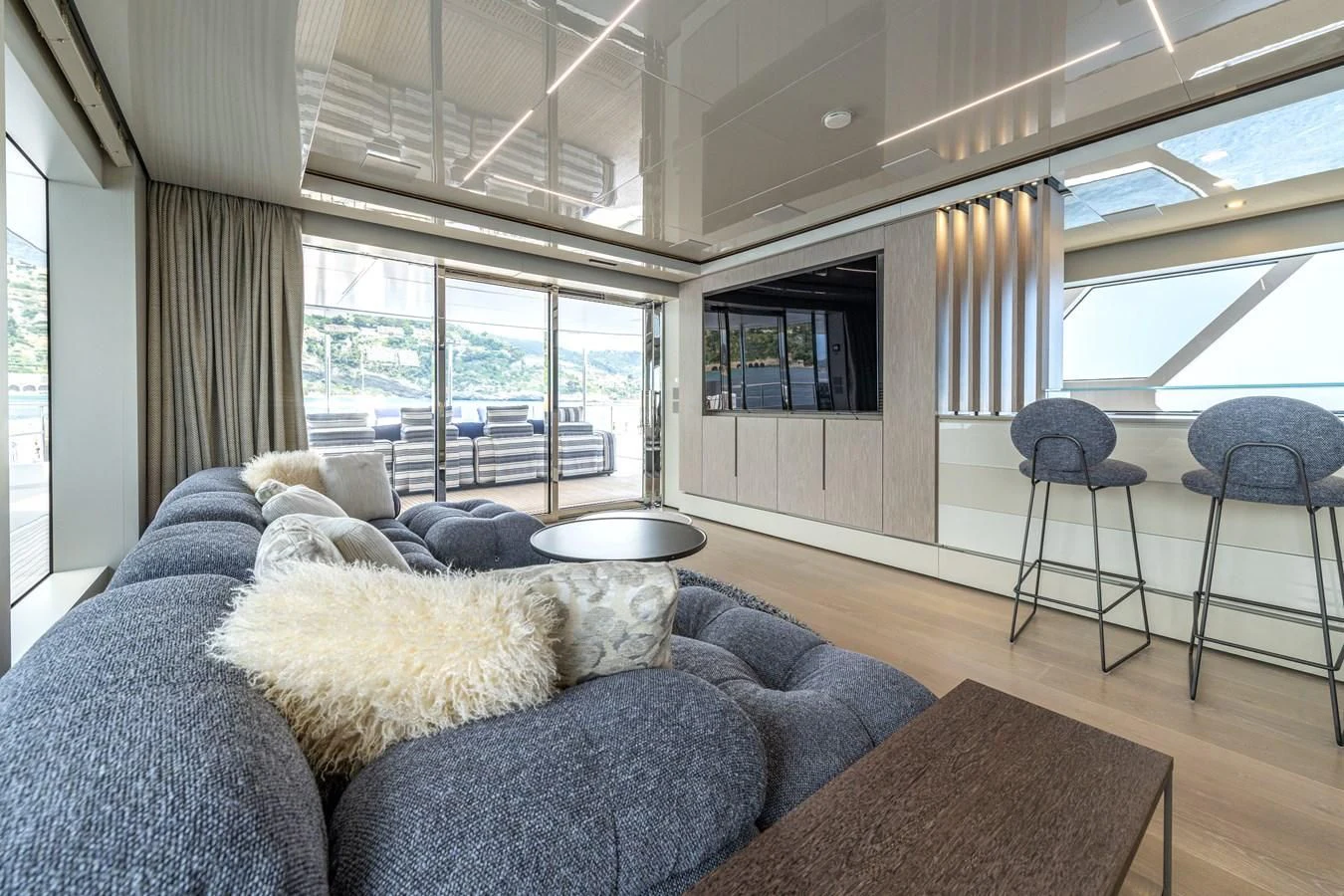 a dog lying on a couch aboard CARITA Yacht for Sale