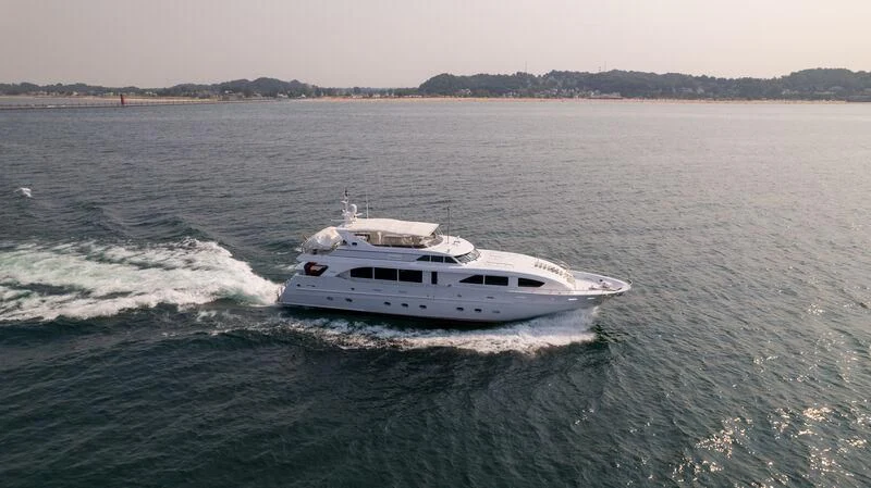a white boat on the water aboard EVELYN Yacht for Sale