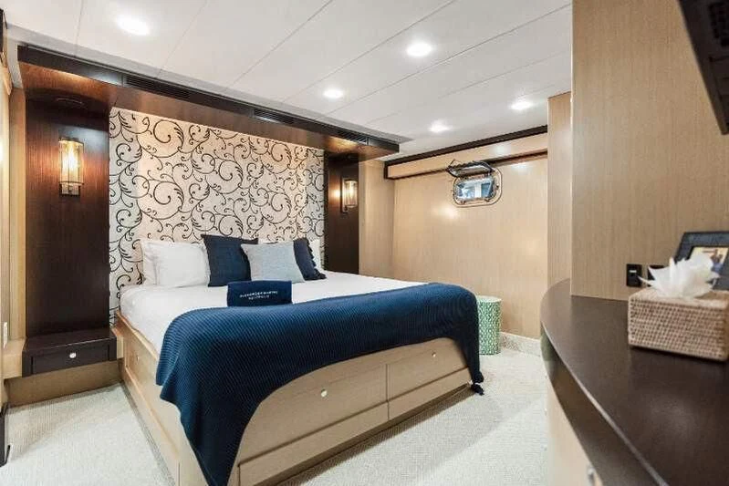 a bed in a room aboard TEXAS T Yacht for Sale