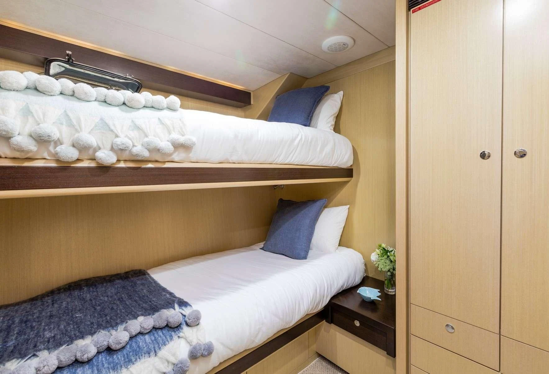 a bed with white sheets aboard TEXAS T Yacht for Sale