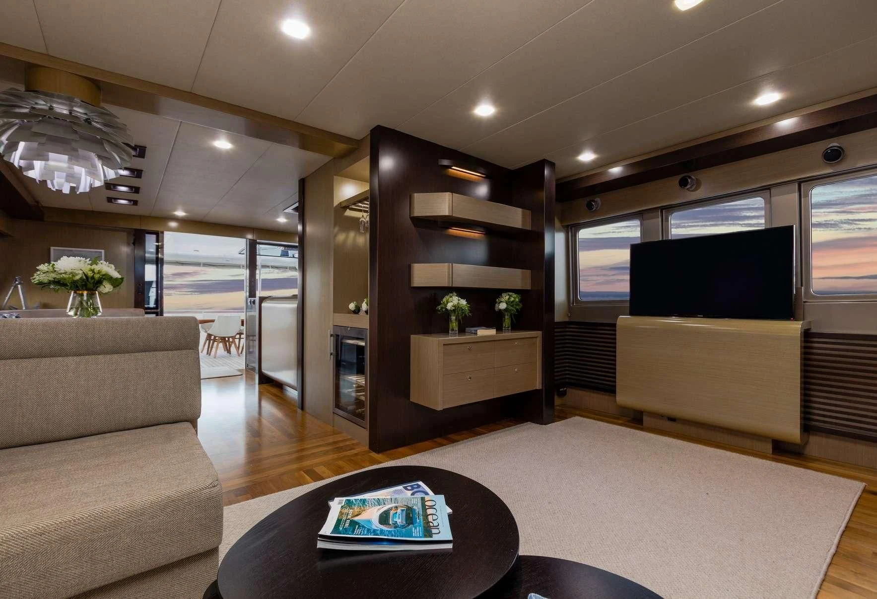 a living room with a large tv aboard TEXAS T Yacht for Sale