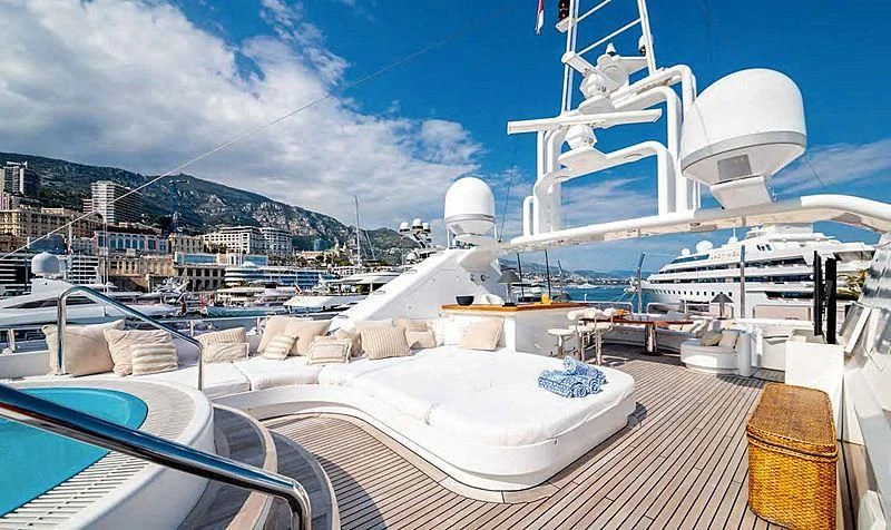a deck with a large white boat aboard TURQUOISE Yacht for Sale