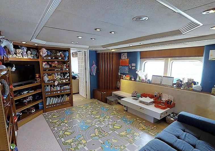 a room with a bed and a tv aboard TURQUOISE Yacht for Sale