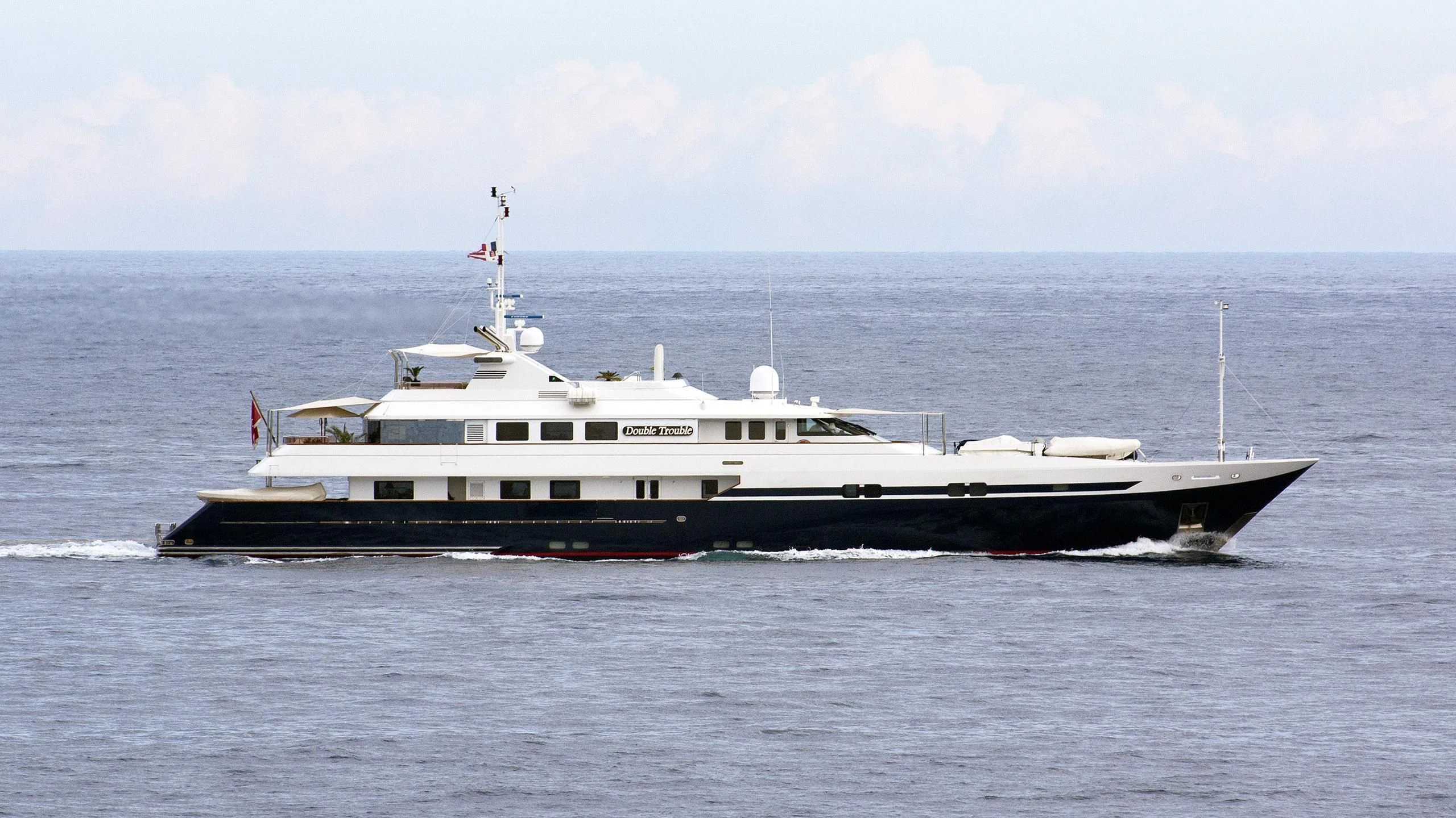 a large boat in the water aboard TURQUOISE Yacht for Sale