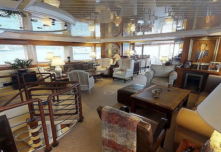 a large room with a large table and chairs aboard TURQUOISE Yacht for Sale
