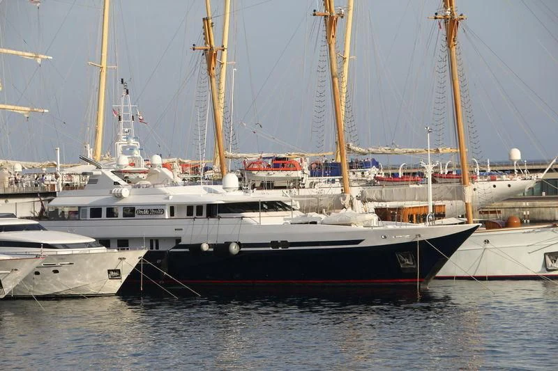 a boat docked at a pier aboard TURQUOISE Yacht for Sale