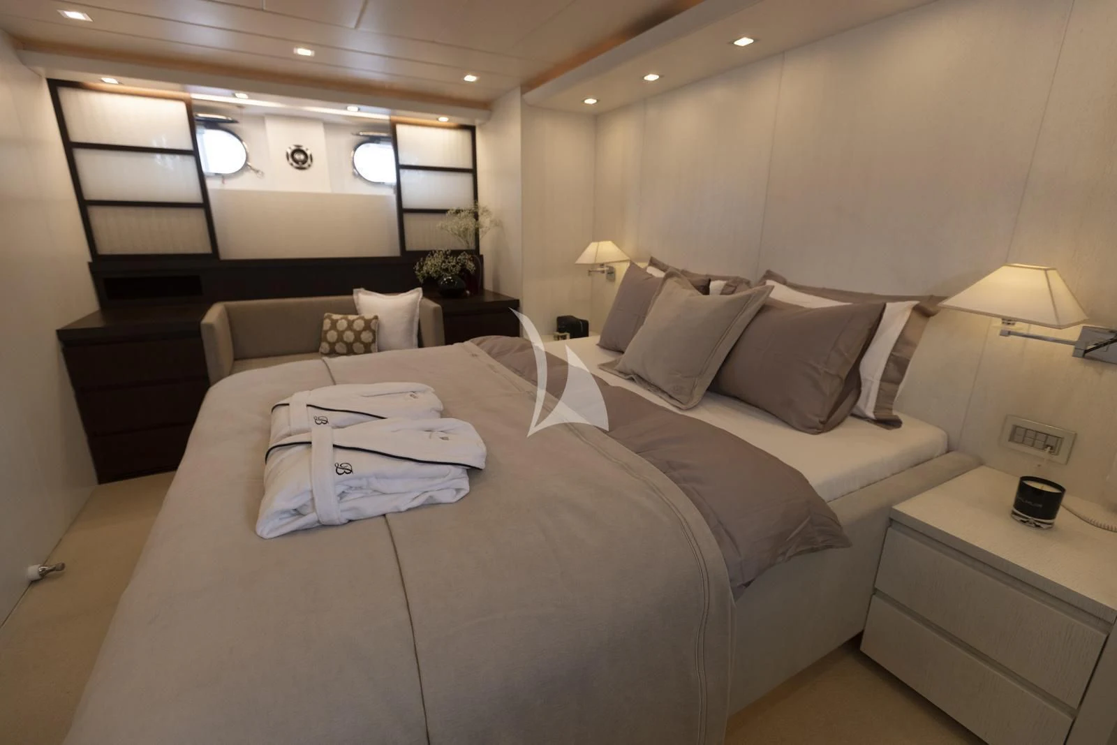 a hotel room with a bed aboard XUMI Yacht for Charter